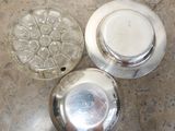 two salt and pepper shakers sitting on a table