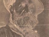 une vieille photo d'un homme barbu portant un chapeau