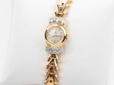 an image of a woman ' s wrist watch on a white pillow