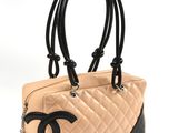 chanel beige quilted tote bag with black trim