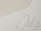 a close up of a piece of paper with a signature on it