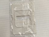 a plastic bag that has a small white object in it