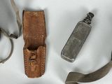 a knife, lighter, and other items that are on the table