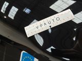 a sticker on the hood of a car that says october