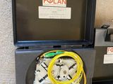 a black box with a yellow wire and a black box with a yellow wire