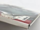 a close up of a book with a picture on it