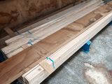 a pile of wood sitting on top of a pallet