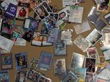 a cork board covered with many different types of cards