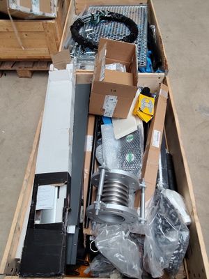 a box full of assorted items sitting on the floor