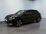 a black volkswagen suv parked in a large room