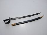 two swords on a white surface with a wooden handle