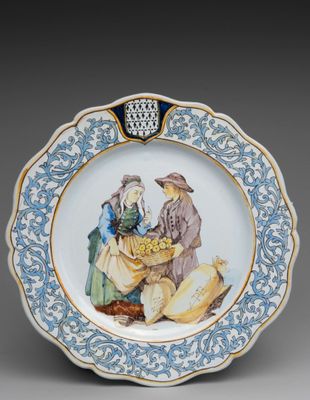 une image représentant une assiette bleue et blanche sur laquelle figurent un homme et une femme