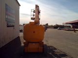 a crane that is sitting in the middle of a parking lot