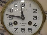 a clock that is on the wall with numbers on it