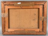 an old picture frame with a picture of a man in a hat