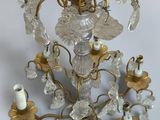 a chandelier that is hanging from the ceiling
