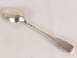 a spoon that is sitting on a table
