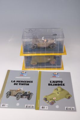 deux livres posés sur la table, avec une petite voiture dans la boîte