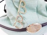 leather bracelet with a gold plated initial charm on a chain