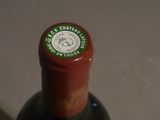 a bottle of wine that is sitting on a table