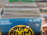 a box full of vinyl records sitting on a table