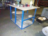a workbench in a garage with a lot of tools on it