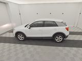 a white suv parked in a garage with a checkered floor