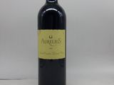 l'image d'une bouteille de vin posée sur une table