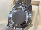 a watch that is sitting in a box on a table