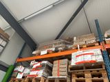 many rolls of tape on the shelves in the warehouse