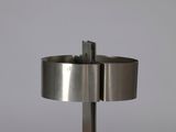 an image of a table with a lamp on top of it