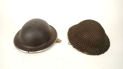 pair of wwii era german steel helmet covers