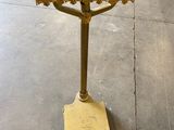 a sign that is on top of a metal stand