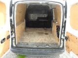 the back of a van with the door open and the floor in the back