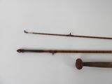 three different types of fishing rods are displayed on a white surface