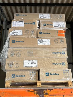 many boxes on the back of a truck in the back of the truck