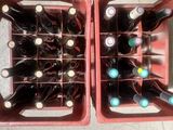 many bottles of wine in a red box