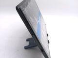 a close up of a cell phone with a broken screen