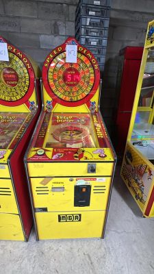 three machines sitting next to each other on the floor