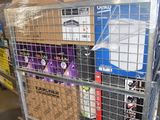 a metal cart with several boxes on it in a warehouse