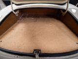 a trunk of a car with a seat folded down