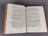 an open book that is sitting on a table