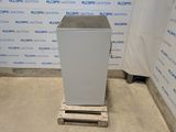 an image of a refrigerator sitting on top of a wooden pallet