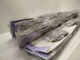 a lot of plastic bags on top of a shelf