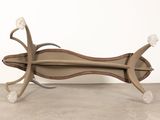 an image of a bench made of wood and leather