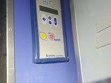 a control panel on the wall of a train