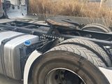 a semi truck that is parked in a lot