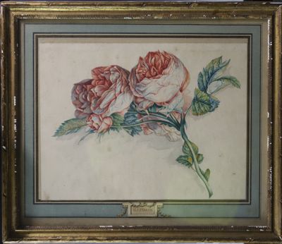 une image représentant un tableau de deux roses dans un cadre doré