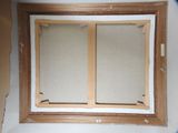 a picture of a window in the corner of a room