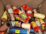 many spools of thread and thread in a box